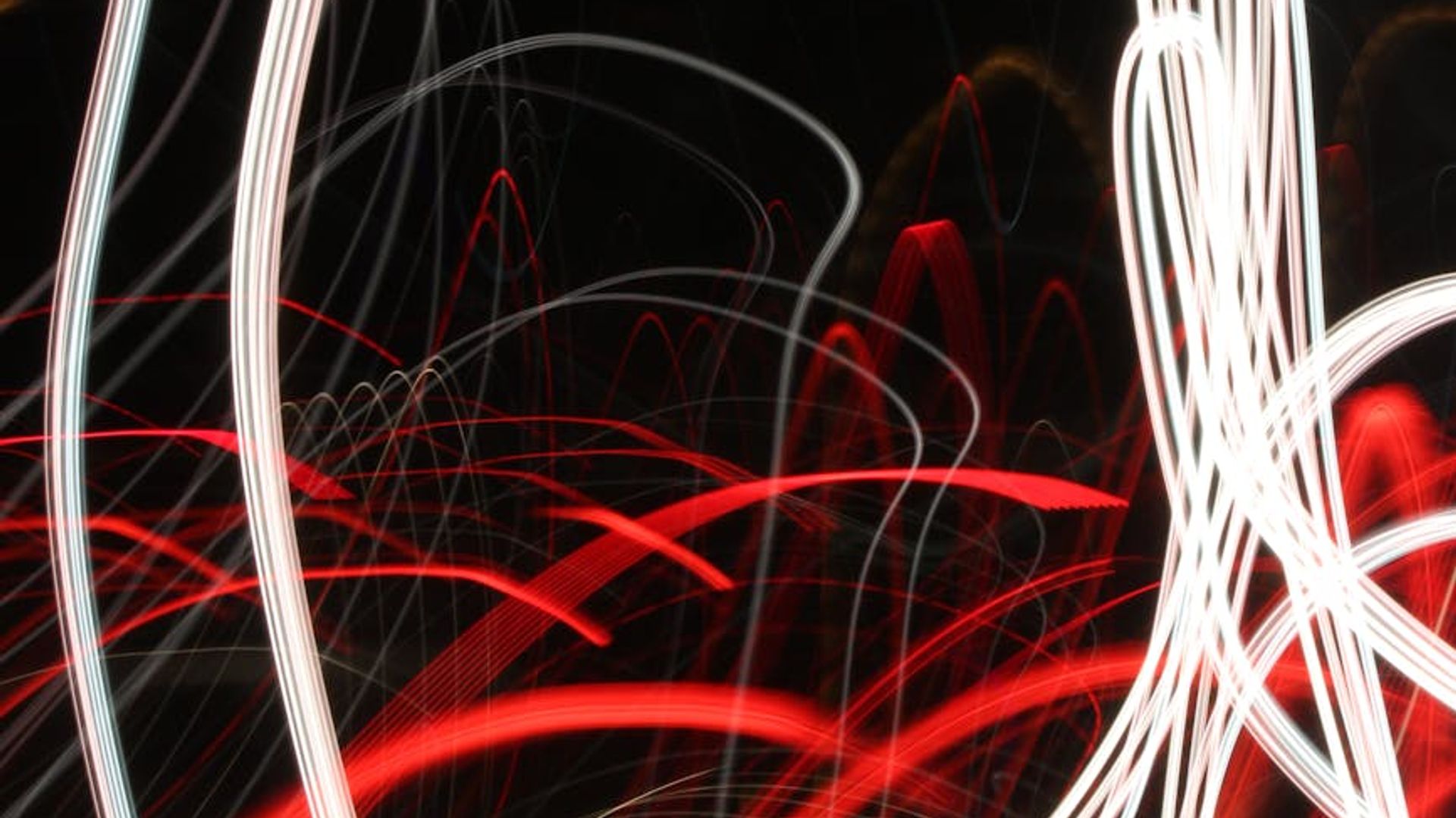 Abstract lines of light showing fluid motion.